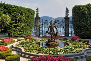 Villa Carlotta's magnificent park with fountains, statues & flower beds.