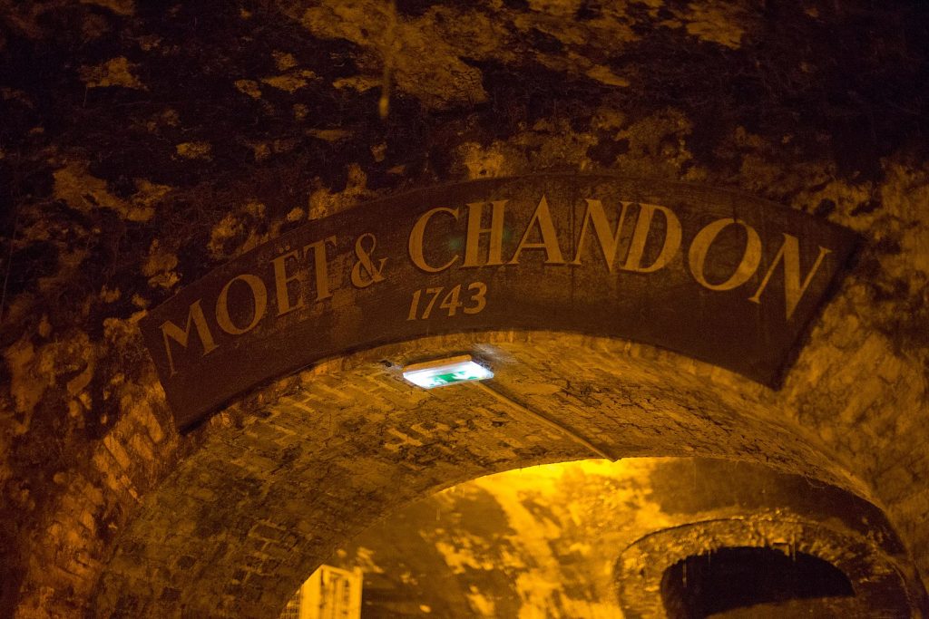 Visit the Moët & Chandon caves (Image from Wikimedia by Victor Grigas)